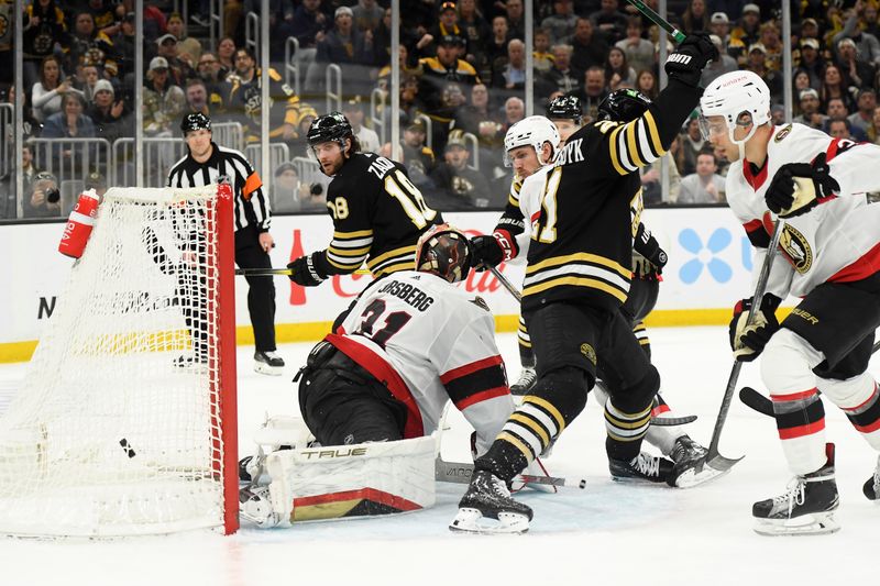 Apr 16, 2024; Boston, Massachusetts, USA;  Boston Bruins center Pavel Zacha (18) scores a goal past Ottawa Senators goaltender Anton Forsberg (31) during the third period at TD Garden. Mandatory Credit: Bob DeChiara-USA TODAY Sports