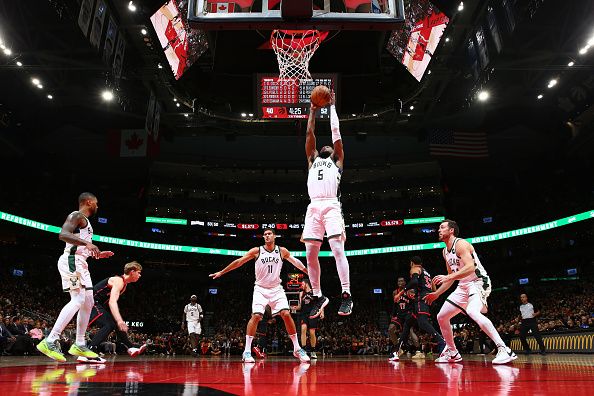 TORONTO, CANADA - NOVEMBER 15:  Malik Beasley #5 of the Milwaukee Bucks grabs a rebound during the game against the Toronto Raptors on November 15, 2023 at the Scotiabank Arena in Toronto, Ontario, Canada.  NOTE TO USER: User expressly acknowledges and agrees that, by downloading and or using this Photograph, user is consenting to the terms and conditions of the Getty Images License Agreement.  Mandatory Copyright Notice: Copyright 2023 NBAE (Photo by Vaughn Ridley/NBAE via Getty Images)