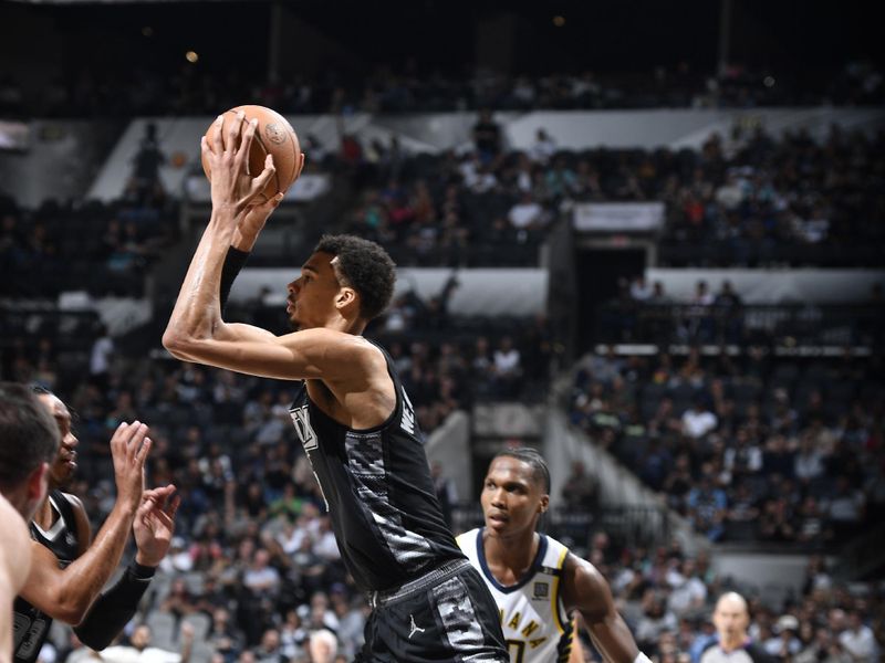 HOUSTON, TX - MARCH 3: Victor Wembanyama #1 of the San Antonio Spurs handles the ball during the game against the Indiana Pacers on March 3, 2024 at the Toyota Center in Houston, Texas. NOTE TO USER: User expressly acknowledges and agrees that, by downloading and or using this photograph, User is consenting to the terms and conditions of the Getty Images License Agreement. Mandatory Copyright Notice: Copyright 2024 NBAE (Photo by Logan Riely/NBAE via Getty Images)