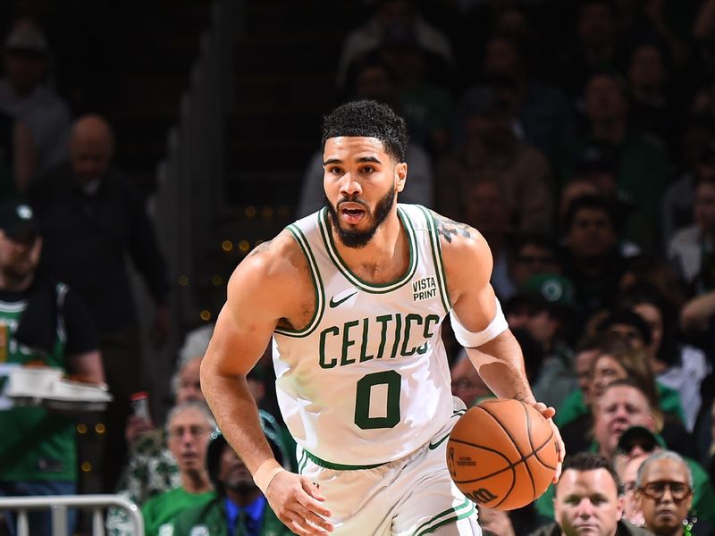 BOSTON, MA - APRIL 21: Jayson Tatum #0 of the Boston Celtics dribbles the ball during the game against the Miami Heat during Round 1 Game 1 of the 2024 NBA Playoffs on April 21, 2024 at the TD Garden in Boston, Massachusetts. NOTE TO USER: User expressly acknowledges and agrees that, by downloading and or using this photograph, User is consenting to the terms and conditions of the Getty Images License Agreement. Mandatory Copyright Notice: Copyright 2024 NBAE  (Photo by Brian Babineau/NBAE via Getty Images)