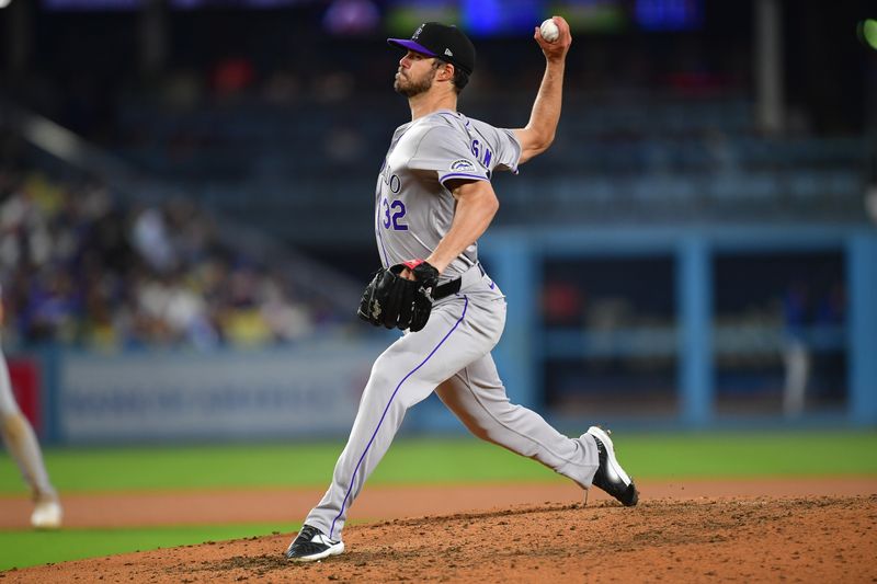 May 31, 2024; Los Angeles, California, USA; Colorado Rockies pitcher Dakota Hudson (32) throws against the Los Angeles Dodgers during the eighth inning at Dodger Stadium. Mandatory Credit: Gary A. Vasquez-USA TODAY Sports