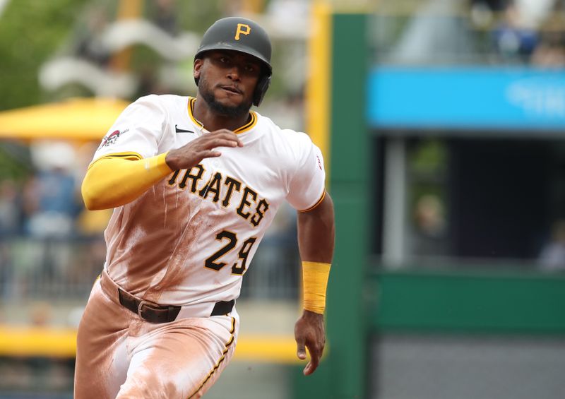 May 25, 2025; Pittsburgh, Pennsylvania, USA;  Pittsburgh Pirates right fielder Alexander Canario (29) runs the bases on his way to scoring a run against the Milwaukee Brewers during the seventh inning at PNC Park. Mandatory Credit: Charles LeClaire-Imagn Images