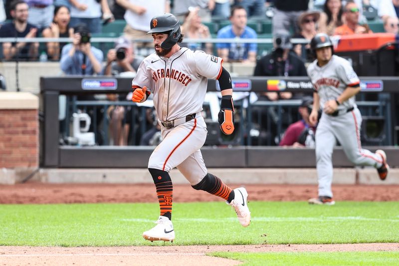 May 25, 2024; New York City, New York, USA;  San Francisco Giants pinch runner Ryan McKenna (34) scores the tying run in the ninth inning against the New York Mets at Citi Field. Mandatory Credit: Wendell Cruz-USA TODAY Sports