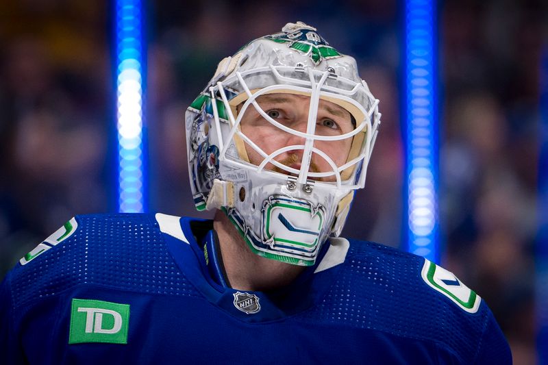 Apr 16, 2024; Vancouver, British Columbia, CAN; Vancouver Canucks goalie Thatcher Demko (35) during a stop in play against the Calgary Flames in the second period at Rogers Arena. Mandatory Credit: Bob Frid-USA TODAY Sports