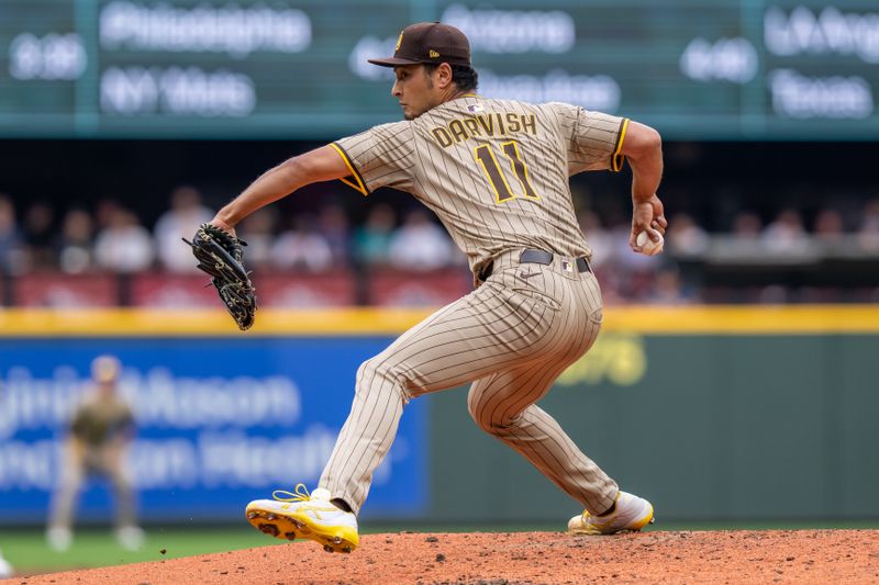 Aug 27, 2025; Seattle, Washington, USA; San Diego Padres starter Yu Darvish (11) delivers a pitch during the third inning against the Seattle Mariners at T-Mobile Park. Mandatory Credit: Stephen Brashear-Imagn Images