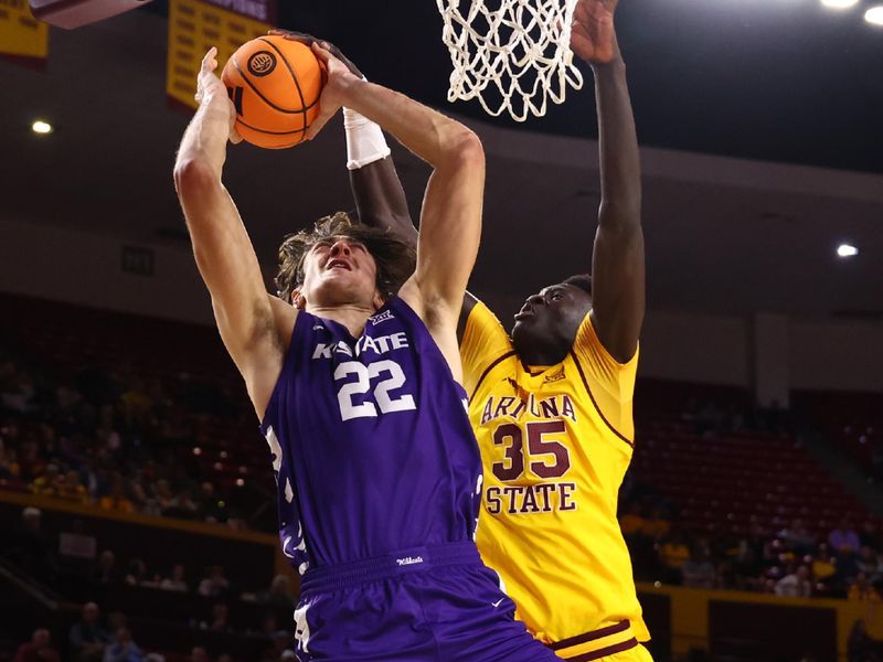 Jan 10, 2026; Tempe, Arizona, USA; Arizona State Sun Devils center Massamba Diop (35) blocks the shot of Kansas State Wildcats center Dorin Buca (22) in the first half at Desert Financial Arena. Mandatory Credit: Mark J. Rebilas-Imagn Images