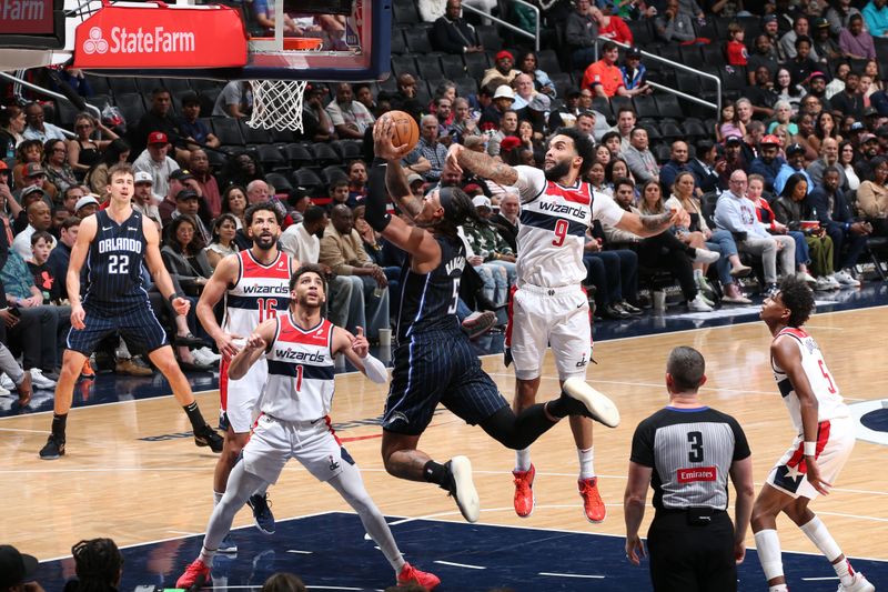 WASHINGTON, DC -? APRIL 3: Paolo Banchero #5 of the Orlando Magic drives to the basket during the game against the Washington Wizards on April 3, 2025 at Capital One Arena in Washington, DC. NOTE TO USER: User expressly acknowledges and agrees that, by downloading and or using this Photograph, user is consenting to the terms and conditions of the Getty Images License Agreement. Mandatory Copyright Notice: Copyright 2025 NBAE (Photo by Stephen Gosling/NBAE via Getty Images)