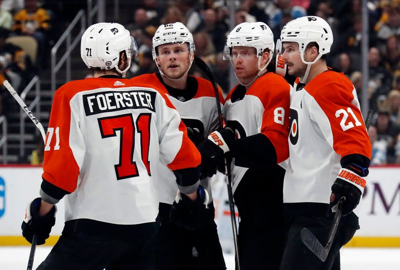 Feb 25, 2024; Pittsburgh, Pennsylvania, USA;  The Philadelphia Flyers celebrate a goal by defenseman Cam York (8) against the Pittsburgh Penguins during the third period at PPG Paints Arena.  Pittsburgh won 7-6. Mandatory Credit: Charles LeClaire-USA TODAY Sports