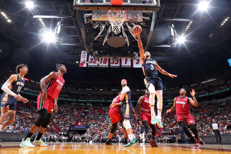 MIAMI, FL - JANUARY 22: CJ McCollum #3 of the New Orleans Pelicans drives to the basket during the game against the Miami Heat on January 22, 2023 at Miami-Dade Arena in Miami, Florida. NOTE TO USER: User expressly acknowledges and agrees that, by downloading and or using this Photograph, user is consenting to the terms and conditions of the Getty Images License Agreement. Mandatory Copyright Notice: Copyright 2023 NBAE (Photo by Nathaniel S. Butler/NBAE via Getty Images)