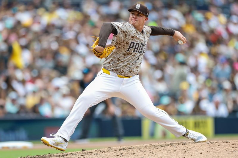 Jun 1, 2025; San Diego, California, USA; San Diego Padres relief pitcher Adrian Morejon (50) throws a pitch during the seventh inning against the Pittsburgh Pirates at Petco Park. Mandatory Credit: David Frerker-Imagn Images