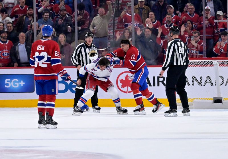 Oct 18, 2025; Montreal, Quebec, CAN; New York Rangers forward Sam Carrick (39) and Montreal Canadiens defenseman Arber Xhekaj (72) fight during the second period at the Bell Centre. Mandatory Credit: Eric Bolte-Imagn Images