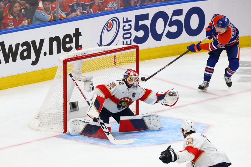 Jun 15, 2024; Edmonton, Alberta, CAN; Edmonton Oilers center Ryan Nugent-Hopkins (93) plays the puck behind Florida Panthers goaltender Sergei Bobrovsky (72) in the first period in game four of the 2024 Stanley Cup Final at Rogers Place. Mandatory Credit: Sergei Belski-USA TODAY Sports
