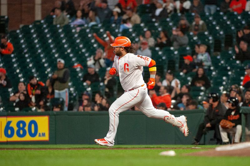 Sep 12, 2023; San Francisco, California, USA; San Francisco Giants shortstop Brandon Crawford (35) rounds first base after hitting a double during the third inning against the Cleveland Guardians at Oracle Park. Mandatory Credit: Ed Szczepanski-USA TODAY Sports