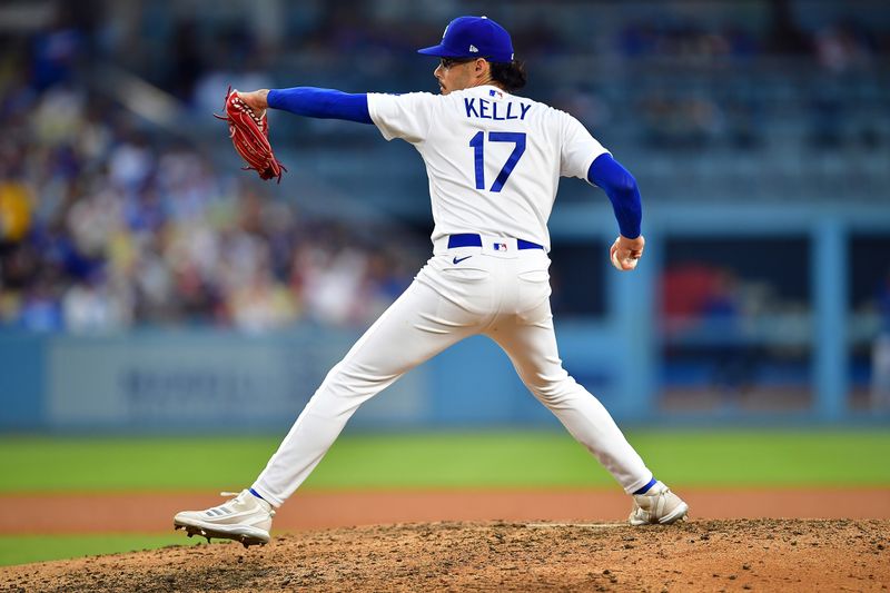 Jul 29, 2023; Los Angeles, California, USA; Los Angeles Dodgers relief pitcher Joe Kelly (17) throws against the Cincinnati Reds during the sixth inning at Dodger Stadium. Mandatory Credit: Gary A. Vasquez-USA TODAY Sports