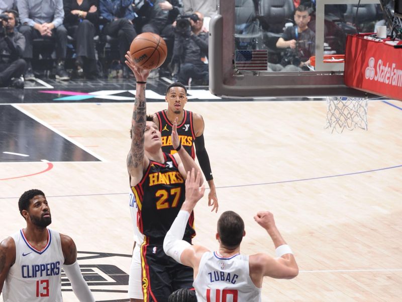 LOS ANGELES, CA - MARCH 17: Vit Krejci #27 of the Atlanta Hawks drives to the basket during the game against the LA Clippers on March 17, 2024 at Crypto.Com Arena in Los Angeles, California. NOTE TO USER: User expressly acknowledges and agrees that, by downloading and/or using this Photograph, user is consenting to the terms and conditions of the Getty Images License Agreement. Mandatory Copyright Notice: Copyright 2024 NBAE (Photo by Adam Pantozzi/NBAE via Getty Images)