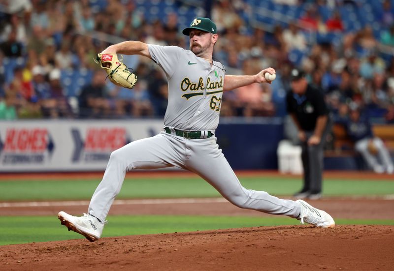 May 30, 2024; St. Petersburg, Florida, USA; Oakland Athletics starting pitcher Hogan Harriss (63) throws a pitch against the Tampa Bay Rays during the second inning at Tropicana Field. Mandatory Credit: Kim Klement Neitzel-USA TODAY Sports