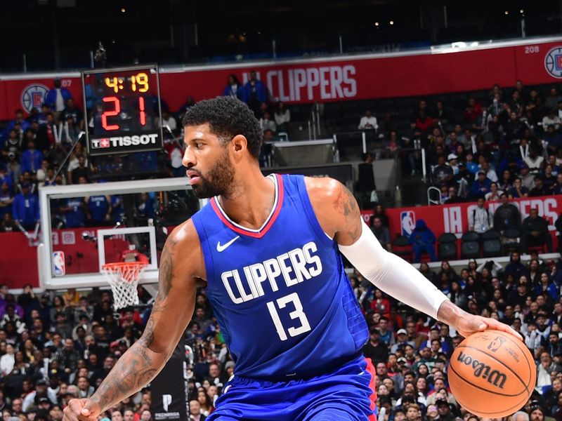 LOS ANGELES, CA - FEBRUARY 12:  Paul George #13 of the LA Clippers goes to the basket during the game on February 12, 2024 at Crypto.Com Arena in Los Angeles, California. NOTE TO USER: User expressly acknowledges and agrees that, by downloading and/or using this Photograph, user is consenting to the terms and conditions of the Getty Images License Agreement. Mandatory Copyright Notice: Copyright 2024 NBAE (Photo by Adam Pantozzi/NBAE via Getty Images)