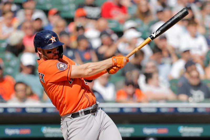 Aug 27, 2023; Detroit, Michigan, USA;  Houston Astros center fielder Chas McCormick (20) hits an RBI single in the eighth inning against the Detroit Tigers at Comerica Park. Mandatory Credit: Rick Osentoski-USA TODAY Sports