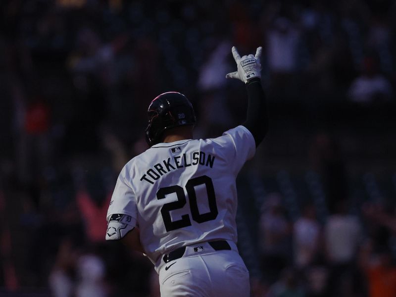 May 13, 2024; Detroit, Michigan, USA;  Detroit Tigers first base Spencer Torkelson (20) celebrates after he hits a two run home run in the eighth inning against the Miami Marlins at Comerica Park. Mandatory Credit: Rick Osentoski-USA TODAY Sports