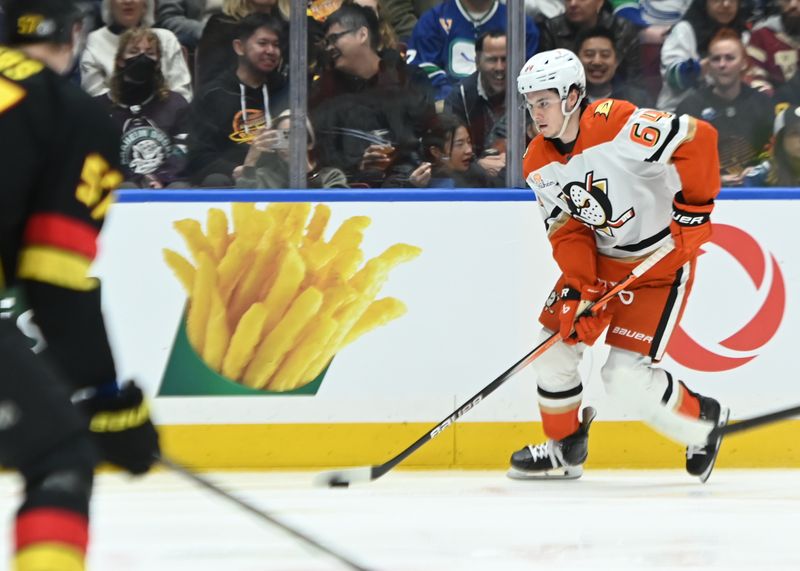 Mar 5, 2025; Vancouver, British Columbia, CAN; Anaheim Ducks forward Sam Colangelo (64) skates with puck at Rogers Arenaagainst the Vancouver Canucks during the second period . Mandatory Credit: Simon Fearn-Imagn Images