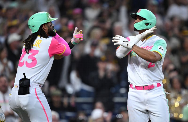 Jun 23, 2023; San Diego, California, USA; San Diego Padres shortstop Xander Bogaerts (2) celebrates with right fielder Fernando Tatis Jr. (23) after hitting a three-run home run against the Washington Nationals during the fifth inning at Petco Park. Mandatory Credit: Orlando Ramirez-USA TODAY Sports