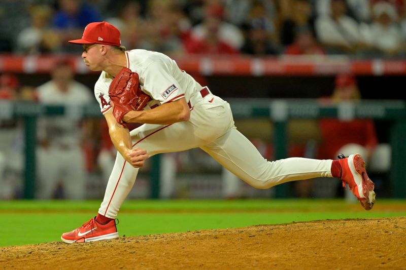 Sep 4, 2024; Anaheim, California, USA;  Los Angeles Angels relief pitcher Ryan Miller (53) delivers to the plate in the ninth inning against the Los Angeles Dodgers at Angel Stadium. Mandatory Credit: Jayne Kamin-Oncea-Imagn Images