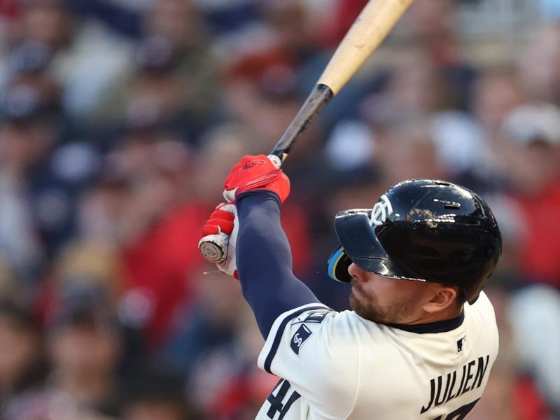 Oct 11, 2023; Minneapolis, Minnesota, USA; Minnesota Twins second baseman Edouard Julien (47) hits a double in the first inning against the Houston Astros during game four of the ALDS for the 2023 MLB playoffs at Target Field. Mandatory Credit: Jesse Johnson-USA TODAY Sports