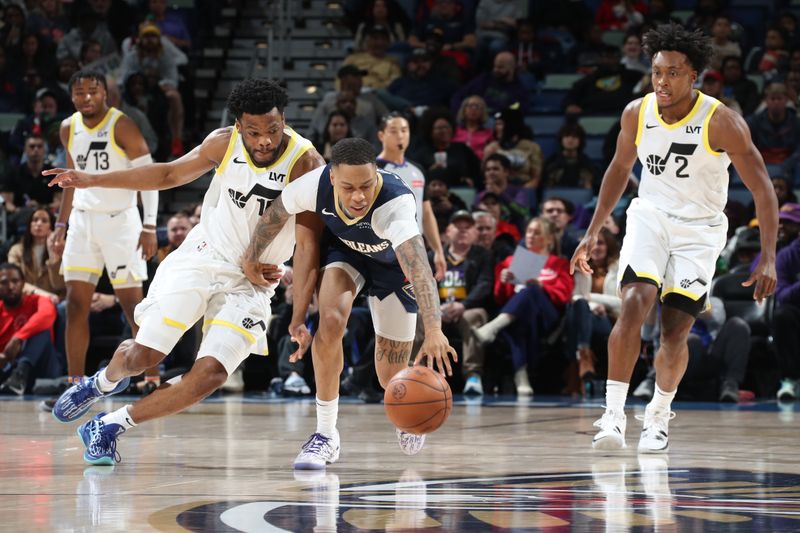 NEW ORLEANS, LA - JANUARY 17:  Jordan Hawkins #24 of the New Orleans Pelicans goes after a loose ball during the game against the Utah Jazz on January 17, 2025 at the Smoothie King Center in New Orleans, Louisiana. NOTE TO USER: User expressly acknowledges and agrees that, by downloading and or using this Photograph, user is consenting to the terms and conditions of the Getty Images License Agreement. Mandatory Copyright Notice: Copyright 2025 NBAE (Photo by Layne Murdoch Jr./NBAE via Getty Images)