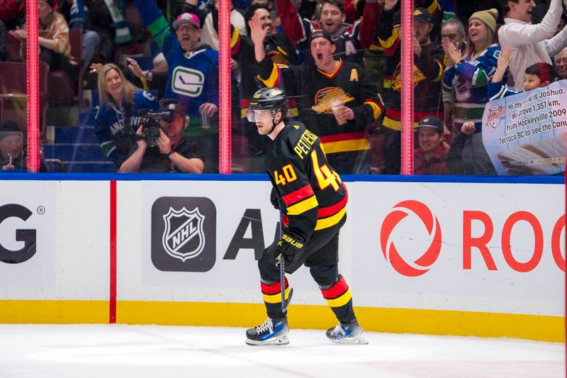 Mar 19, 2024; Vancouver, British Columbia, CAN; Vancouver Canucks forward Elias Pettersson (40) celebrates his second goal of the game against the Buffalo Sabres in the third period at Rogers Arena. Vancouver won 3 -2. Mandatory Credit: Bob Frid-USA TODAY Sports