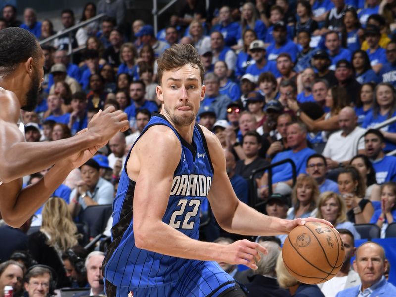 ORLANDO, FL - APRIL 27: Franz Wagner #22 of the Orlando Magic dribbles the ball during the game against the Cleveland Cavaliers during Round 1 Game 4 of the 2024 NBA Playoffs on April 27, 2024 at the Kia Center in Orlando, Florida. NOTE TO USER: User expressly acknowledges and agrees that, by downloading and or using this photograph, User is consenting to the terms and conditions of the Getty Images License Agreement. Mandatory Copyright Notice: Copyright 2024 NBAE (Photo by Fernando Medina/NBAE via Getty Images)