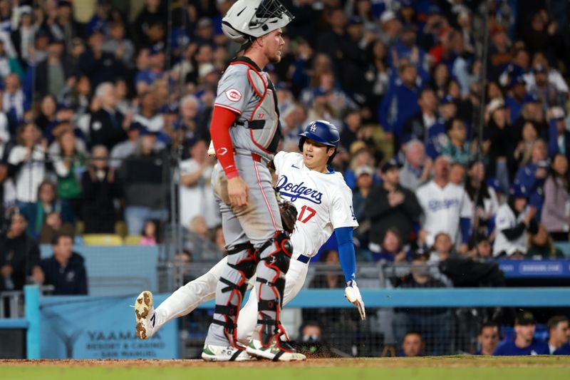 May 17, 2024; Los Angeles, California, USA;  Los Angeles Dodgers designated hitter Shohei Ohtani (17) scores a run during the seventh inning against the Cincinnati Reds at Dodger Stadium. Mandatory Credit: Kiyoshi Mio-USA TODAY Sports