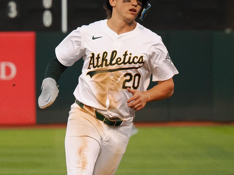 Jul 22, 2024; Oakland, California, USA; Oakland Athletics second baseman Zack Gelof (20) runs for third base against the Houston Astros during the fourth inning at Oakland-Alameda County Coliseum. Mandatory Credit: Kelley L Cox-USA TODAY Sports