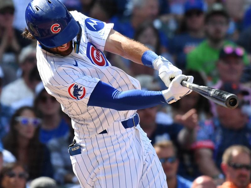 Aug 22, 2024; Chicago, Illinois, USA; Chicago Cubs shortstop Dansby Swanson (7) hits an RBI single during the seventh inning against the Detroit Tigers at Wrigley Field. Mandatory Credit: Patrick Gorski-USA TODAY Sports