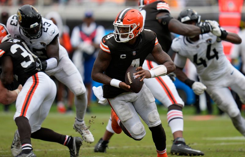 Cleveland Browns quarterback Deshaun Watson (4) scramble against the Jacksonville Jaguars during the second half of an NFL football game Sunday, Sept. 15, 2024, in Jacksonville, Fla. (AP Photo/John Raoux)