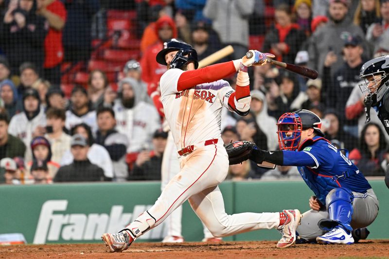 Apr 10, 2025; Boston, Massachusetts, USA; Boston Red Sox shortstop Trevor Story (10) hist the game winning RBI during the tenth inning against the Toronto Blue Jays at Fenway Park. Mandatory Credit: Eric Canha-Imagn Images