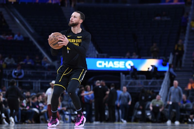 SAN FRANCISCO, CA - MARCH 20: Stephen Curry #30 of the Golden State Warriors warms up before the game against the Memphis Grizzlies on March 20, 2024 at Chase Center in San Francisco, California. NOTE TO USER: User expressly acknowledges and agrees that, by downloading and or using this photograph, user is consenting to the terms and conditions of Getty Images License Agreement. Mandatory Copyright Notice: Copyright 2024 NBAE (Photo by Noah Graham/NBAE via Getty Images)