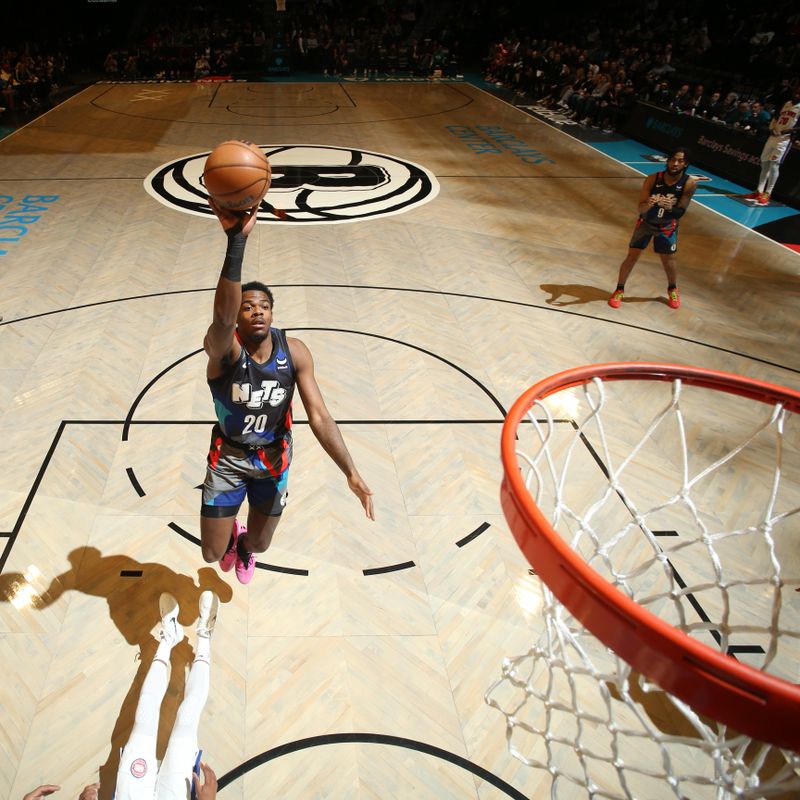 BROOKLYN, NY - APRIL 6: Day'Ron Sharpe #20 of the Brooklyn Nets drives to the basket during the game against the Detroit Pistons on April 6, 2024 at Barclays Center in Brooklyn, New York. NOTE TO USER: User expressly acknowledges and agrees that, by downloading and or using this Photograph, user is consenting to the terms and conditions of the Getty Images License Agreement. Mandatory Copyright Notice: Copyright 2024 NBAE (Photo by Nathaniel S. Butler/NBAE via Getty Images)