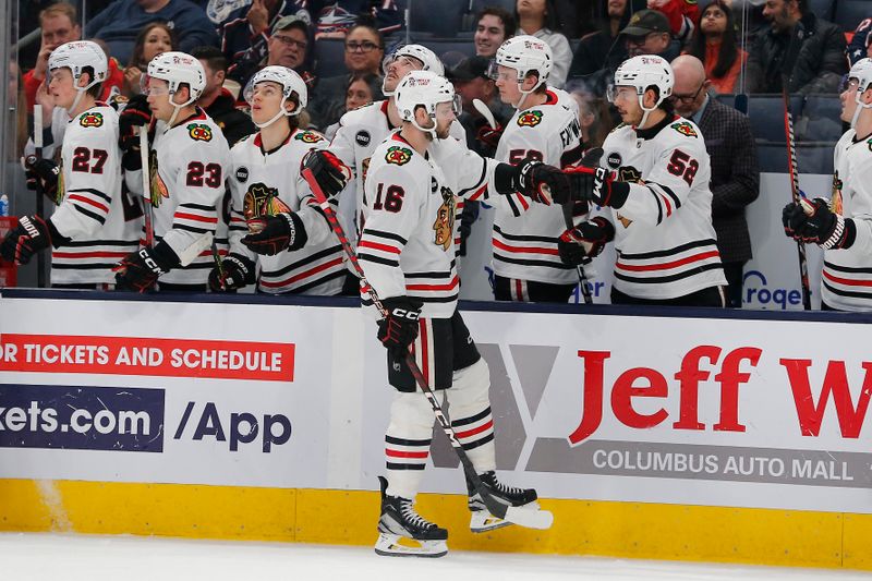 Nov 22, 2023; Columbus, Ohio, USA; Chicago Blackhawks center Jason Dickinson (16) celebrates his goal against the Columbus Blue Jackets during the third period at Nationwide Arena. Mandatory Credit: Russell LaBounty-USA TODAY Sports