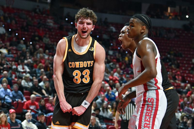 Feb 3, 2024; Las Vegas, Nevada, USA; Wyoming Cowboys forward Mason Walters (33) reacts to scoring on the UNLV Rebels in the second half at Thomas & Mack Center. Mandatory Credit: Candice Ward-USA TODAY Sports