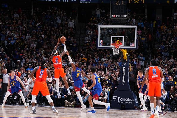 DENVER, CO - DECEMBER 16: Shai Gilgeous-Alexander #2 of the Oklahoma City Thunder scores the go ahead basket during the game against the Denver Nuggets on December 16, 2023 at the Ball Arena in Denver, Colorado. NOTE TO USER: User expressly acknowledges and agrees that, by downloading and/or using this Photograph, user is consenting to the terms and conditions of the Getty Images License Agreement. Mandatory Copyright Notice: Copyright 2023 NBAE (Photo by Garrett Ellwood/NBAE via Getty Images)