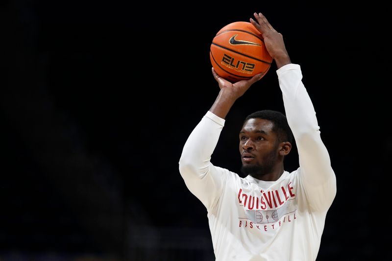 Feb 17, 2024; Pittsburgh, Pennsylvania, USA;  Louisville Cardinals forward Brandon Huntley-Hatfield (5) warms up before a game against the Pittsburgh Panthers at the Petersen Events Center. Mandatory Credit: Charles LeClaire-USA TODAY Sports