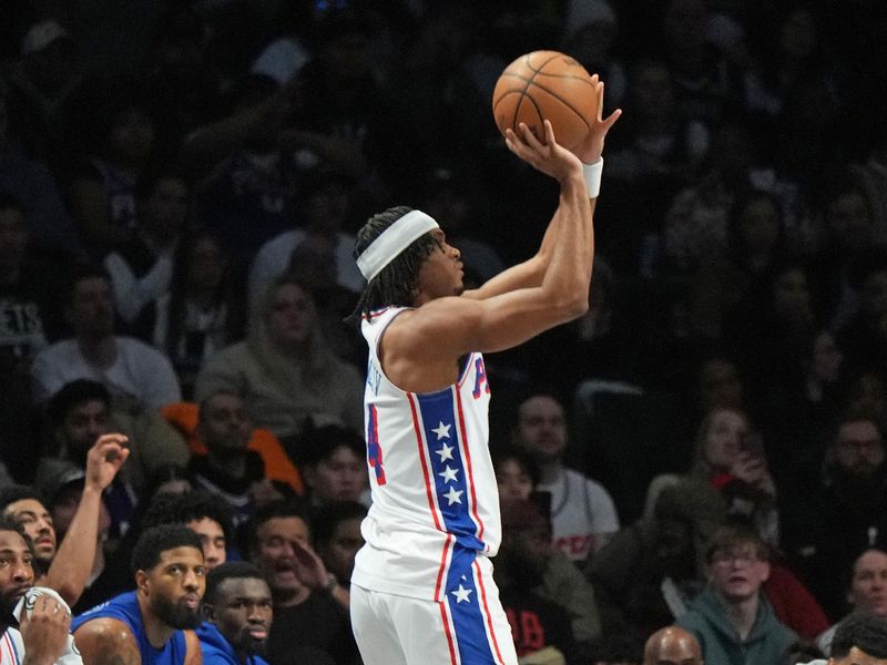 BROOKLYN, NY - FEBRUARY 12: Ricky Council IV #14 of the Philadelphia 76ers shoots the ball during the game against the Brooklyn Nets on February 12, 2025 at Barclays Center in Brooklyn, New York. NOTE TO USER: User expressly acknowledges and agrees that, by downloading and or using this Photograph, user is consenting to the terms and conditions of the Getty Images License Agreement. Mandatory Copyright Notice: Copyright 2025 NBAE (Photo by Jesse D. Garrabrant/NBAE via Getty Images)