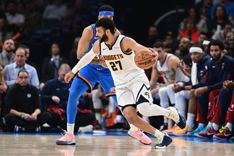 OKLAHOMA CITY, OKLAHOMA - JANUARY 31: Jamal Murray #27 of the Denver Nuggets looks to drive during the first half against the Oklahoma City Thunder at Paycom Center on January 31, 2024 in Oklahoma City, Oklahoma. NOTE TO USER: User expressly acknowledges and agrees that, by downloading and or using this Photograph, user is consenting to the terms and conditions of the Getty Images License Agreement. (Photo by Joshua Gateley/Getty Images)