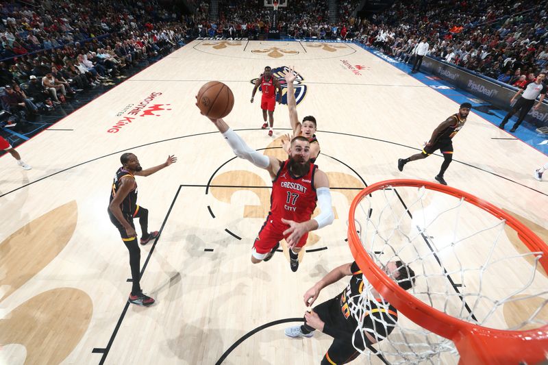 NEW ORLEANS, LA - APRIL 1:  Jonas Valanciunas #17 of the New Orleans Pelicans drives to the basket during the game against the Phoenix Suns on April 1, 2024 at the Smoothie King Center in New Orleans, Louisiana. NOTE TO USER: User expressly acknowledges and agrees that, by downloading and or using this Photograph, user is consenting to the terms and conditions of the Getty Images License Agreement. Mandatory Copyright Notice: Copyright 2024 NBAE (Photo by Layne Murdoch Jr./NBAE via Getty Images)