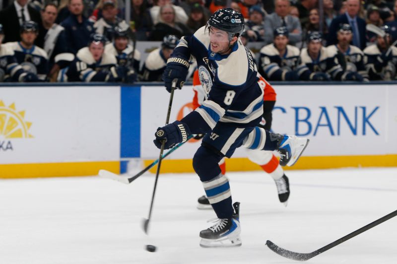 Jan 28, 2026; Columbus, Ohio, USA; Columbus Blue Jackets defenseman Zach Werenski (8) wrists a shot on goal against the Philadelphia Flyers  during the second period at Nationwide Arena. Mandatory Credit: Russell LaBounty-Imagn Images