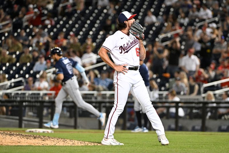 Apr 4, 2023; Washington, District of Columbia, USA; Washington Nationals relief pitcher Kyle Finnegan (67) reacts after giving up a solo home run to Tampa Bay Rays designated hitter Josh Lowe (15) during the ninth inning at Nationals Park. Mandatory Credit: Brad Mills-USA TODAY Sports