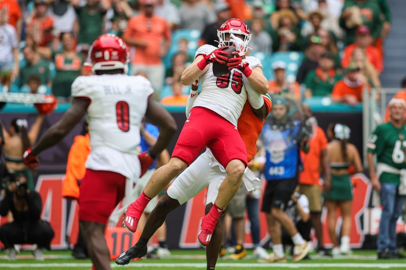 Nov 18, 2023; Miami Gardens, Florida, USA; Louisville Cardinals tight end Nate Kurisky (85) catches the football against the Miami Hurricanes during the first quarter at Hard Rock Stadium. Mandatory Credit: Sam Navarro-USA TODAY Sports