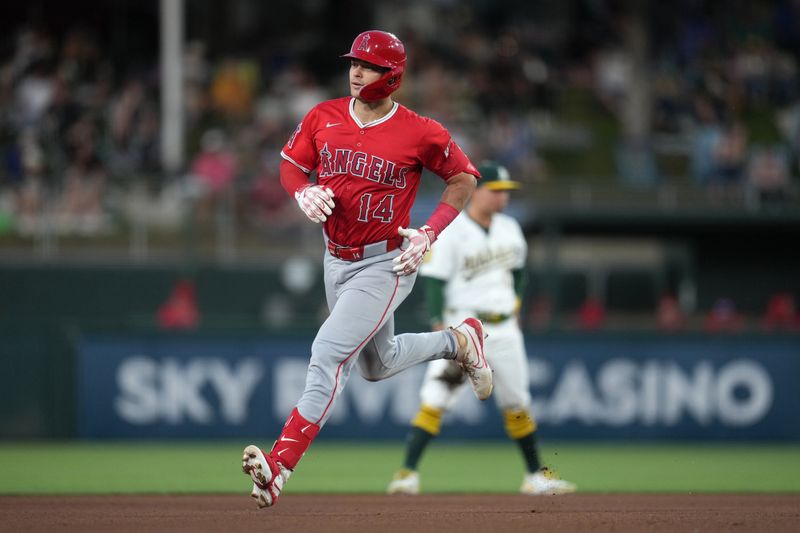 May 21, 2025; West Sacramento, California, USA; Los Angeles Angels catcher Logan O'Hoppe (14) rounds second base after hitting a home run against the Athletics in the fourth inning at Sutter Health Park. Mandatory Credit: Cary Edmondson-Imagn Images