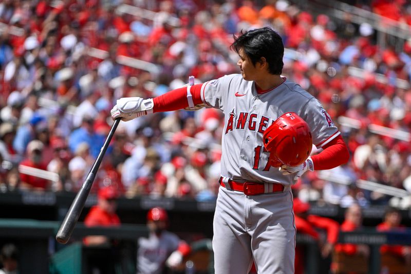 May 4, 2023; St. Louis, Missouri, USA;  Los Angeles Angels designated hitter Shohei Ohtani (17) takes off his helmet after calling time during an at bat against the St. Louis Cardinals in the eighth inning at Busch Stadium. Mandatory Credit: Jeff Curry-USA TODAY Sports