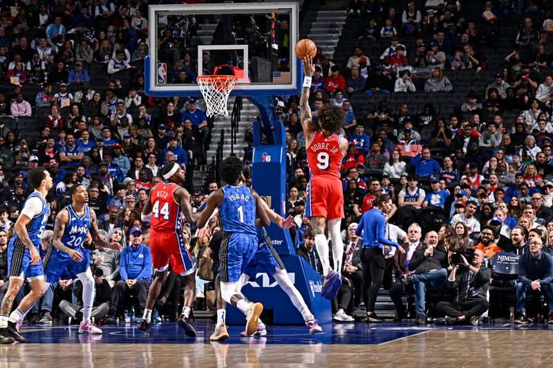 PHILADELPHIA, PA - APRIL 12: Kelly Oubre Jr. #9 of the Philadelphia 76ers drives to the basket during the game against the Orlando Magic on April 12, 2024 at the Wells Fargo Center in Philadelphia, Pennsylvania NOTE TO USER: User expressly acknowledges and agrees that, by downloading and/or using this Photograph, user is consenting to the terms and conditions of the Getty Images License Agreement. Mandatory Copyright Notice: Copyright 2024 NBAE (Photo by David Dow/NBAE via Getty Images)